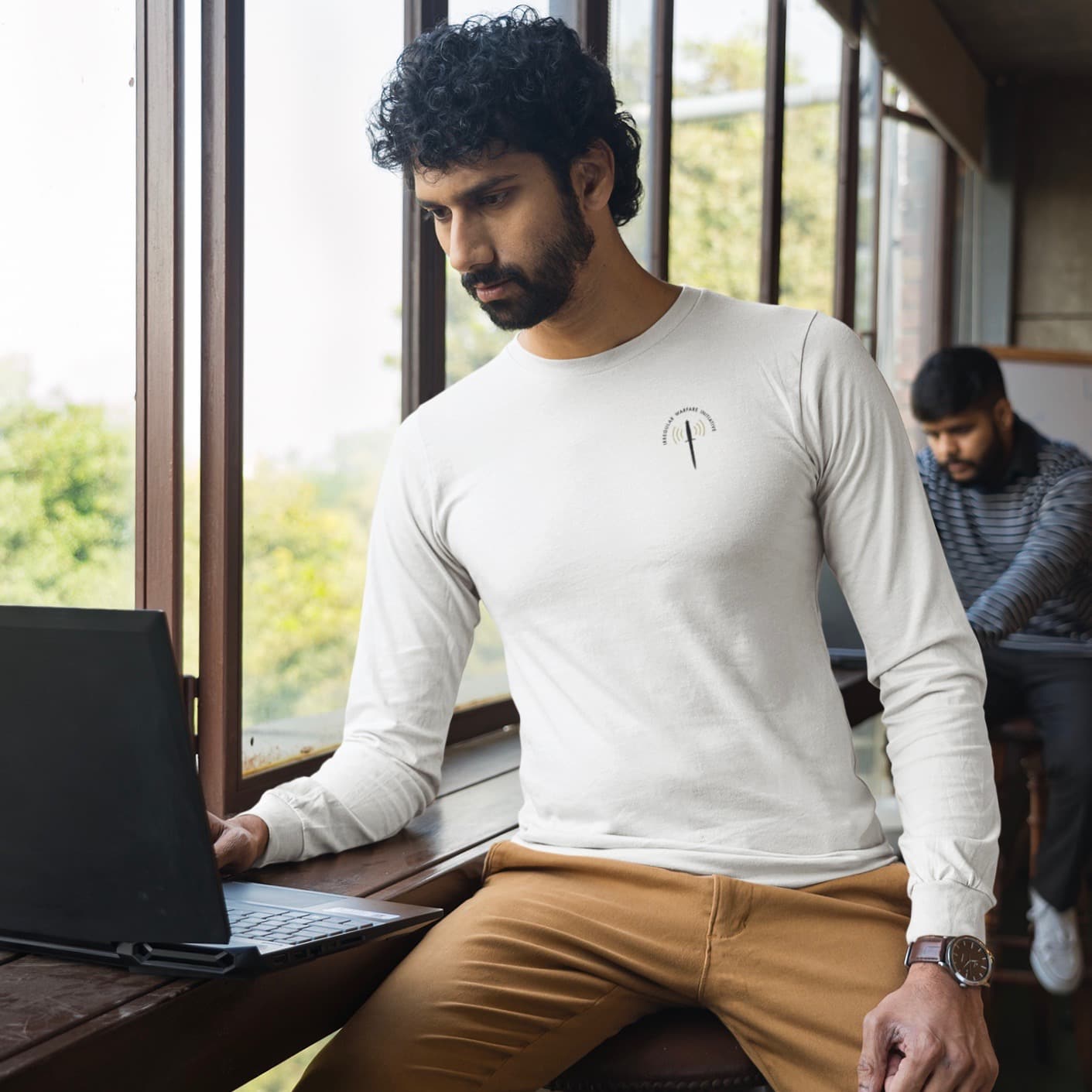 bella canvas long sleeve tee mockup featuring a man working
